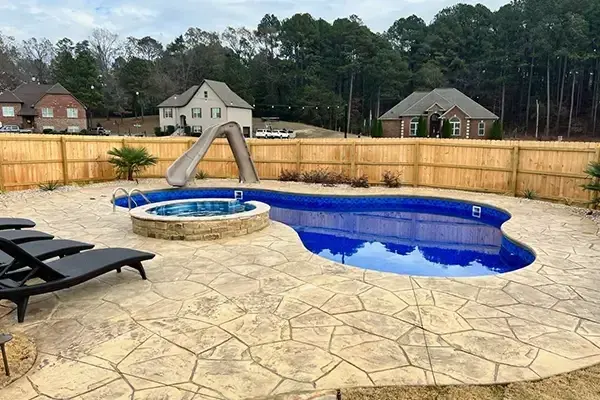 Custom inground pool with patio